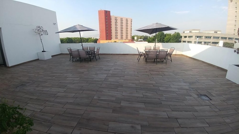 Imagen de los exteriores del Hotel Montemorelos Suites. Foto 10