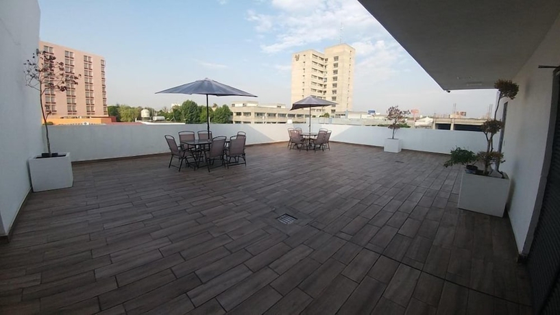 Imagen de los exteriores del Hotel Montemorelos Suites. Foto 11