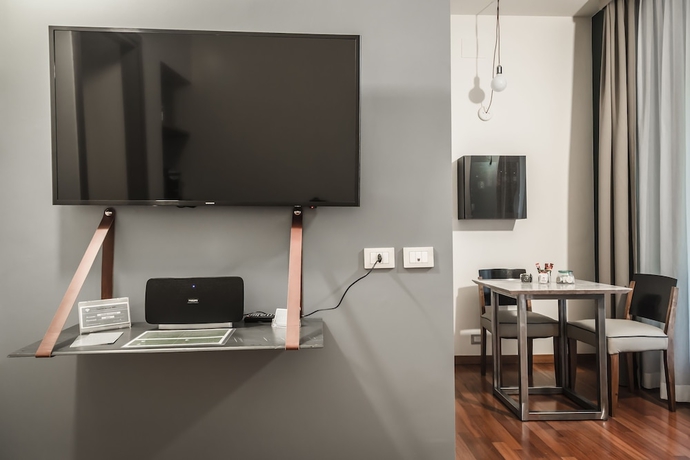 Imagen de la habitación del Hotel Montenapoleone Suites. Foto 5