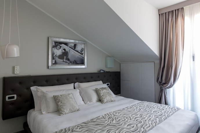 Imagen de la habitación del Hotel Montenapoleone Suites. Foto 12