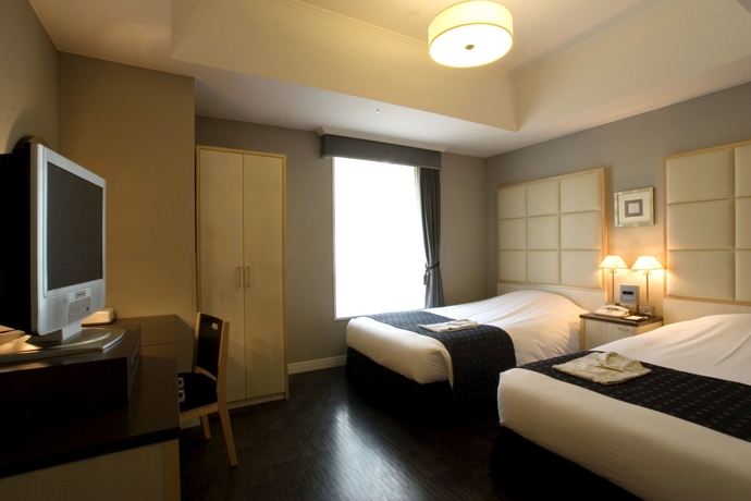 Imagen de la habitación del Hotel Monterey Ginza. Foto 12