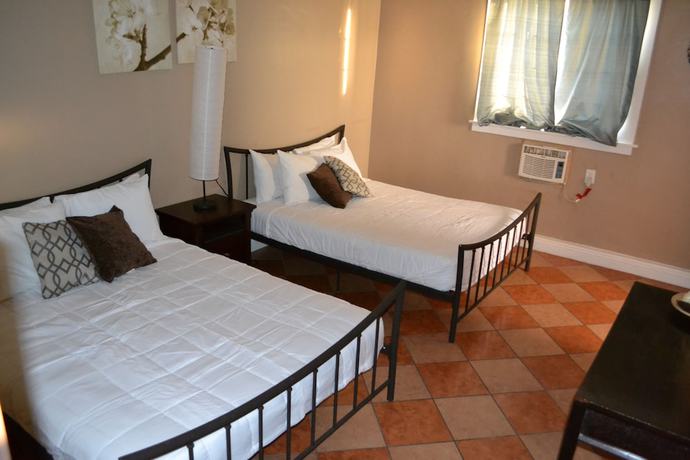 Imagen de la habitación del Hotel Monterey Inn. Foto 4