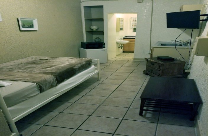 Imagen de la habitación del Hotel Monterey Inn. Foto 7