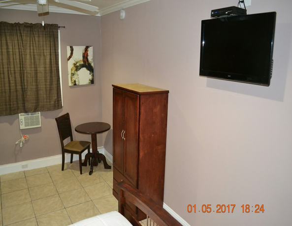 Imagen de la habitación del Hotel Monterey Inn. Foto 13