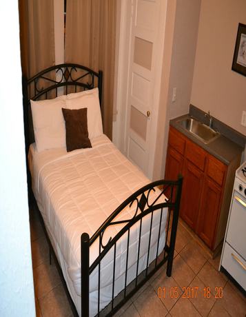 Imagen de la habitación del Hotel Monterey Inn. Foto 15