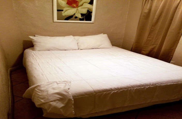 Imagen de la habitación del Hotel Monterey Inn. Foto 16