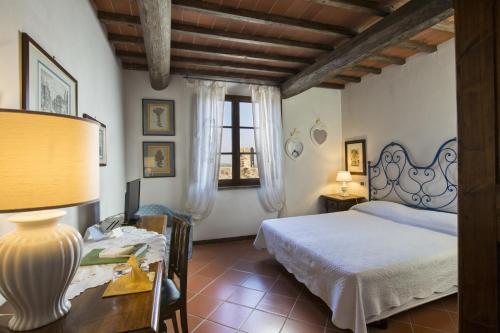 Imagen de la habitación del Hotel Monteriggioni. Foto 9