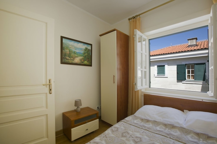 Imagen de la habitación del Hotel Montesan Apartments. Foto 10