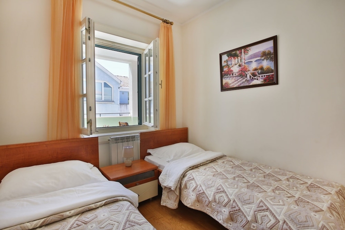 Imagen de la habitación del Hotel Montesan Apartments. Foto 18