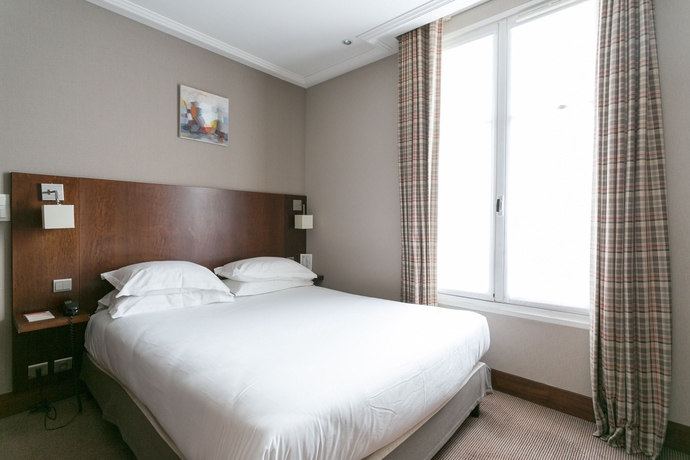 Imagen de la habitación del Hotel Montfleuri Paris. Foto 12