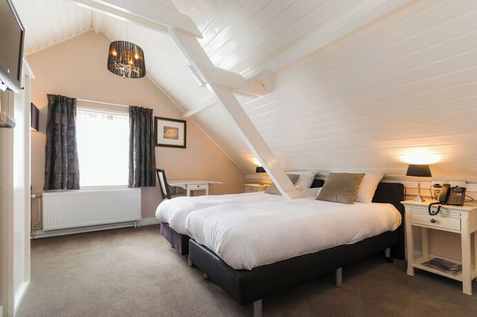 Imagen de la habitación del Hotel Montfoort. Foto 15