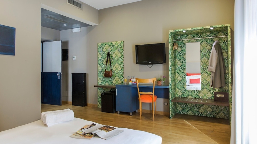 Imagen de la habitación del Hotel Monti First. Foto 5