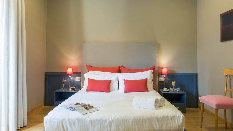 Imagen de la habitación del Hotel Monti First. Foto 6