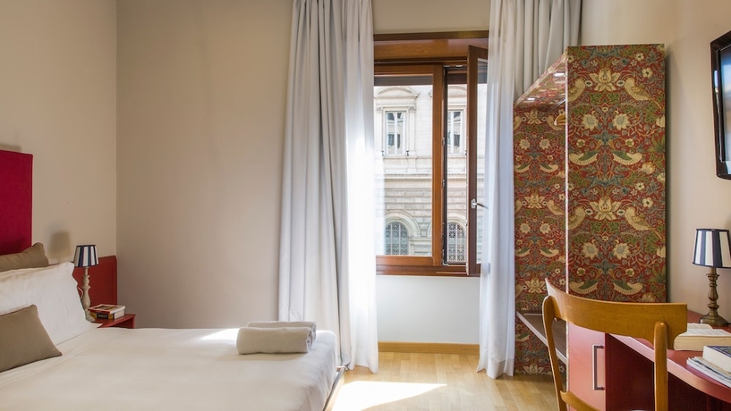 Imagen de la habitación del Hotel Monti First. Foto 7