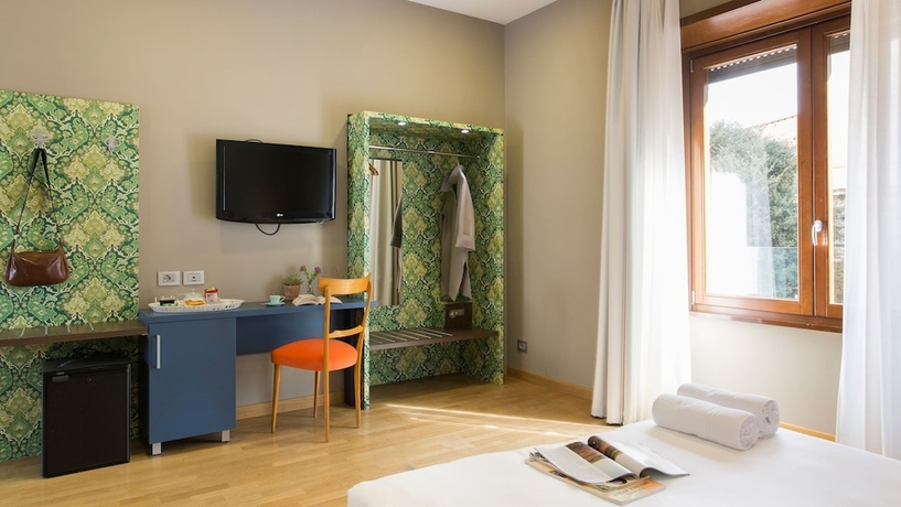 Imagen de la habitación del Hotel Monti First. Foto 11