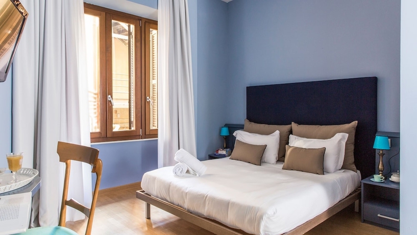 Imagen de la habitación del Hotel Monti First. Foto 12