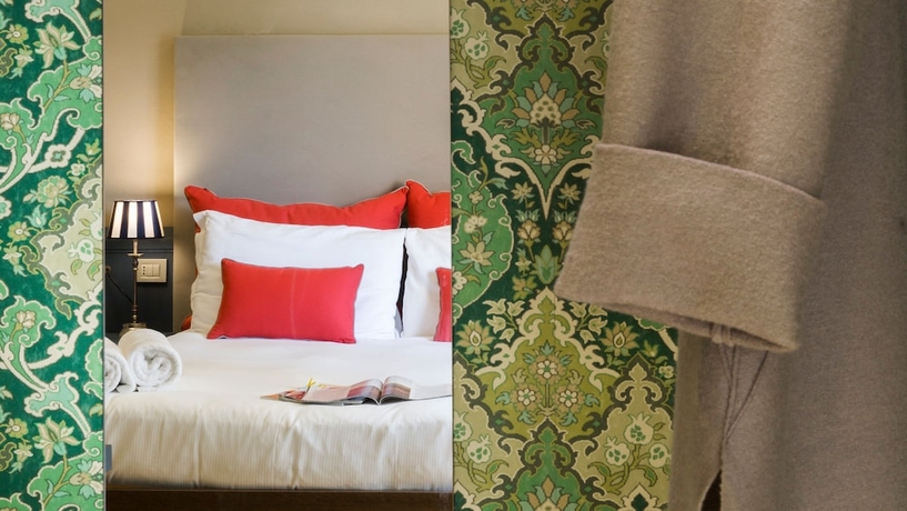 Imagen de la habitación del Hotel Monti First. Foto 16