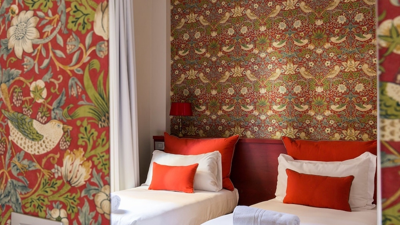 Imagen de la habitación del Hotel Monti First. Foto 17