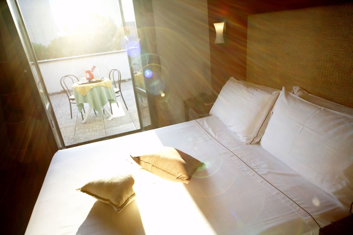 Imagen de la habitación del Hotel Montini. Foto 7