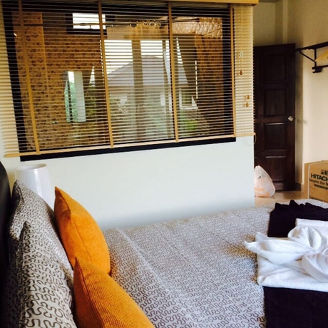 Imagen de la habitación del Hotel Montra Nakhon Guesthouse. Foto 5