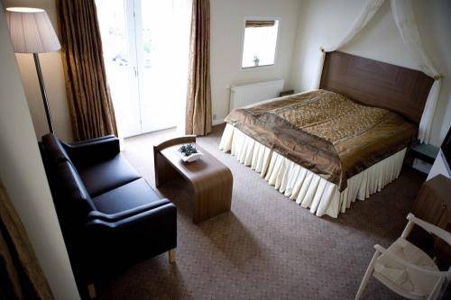 Imagen de la habitación del Hotel Montra Sabro Kro. Foto 5