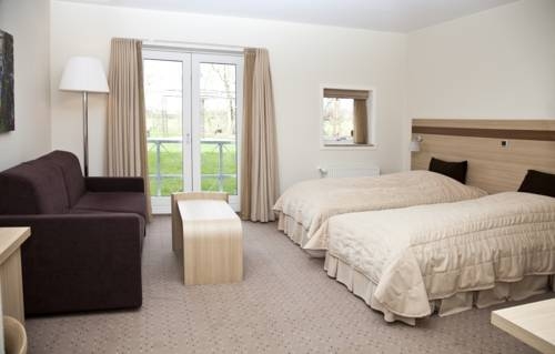 Imagen de la habitación del Hotel Montra Sabro Kro. Foto 6