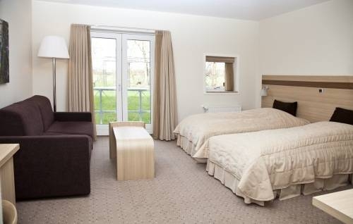 Imagen de la habitación del Hotel Montra Sabro Kro. Foto 8