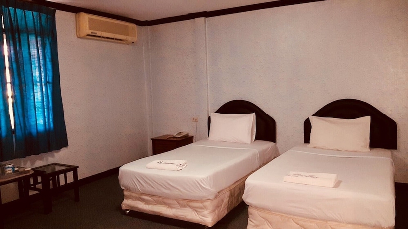 Imagen de la habitación del Hotel Montree. Foto 8