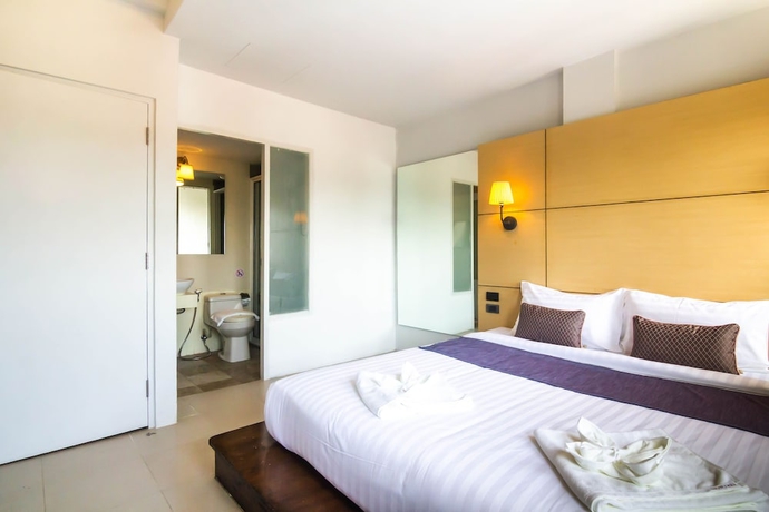 Imagen de la habitación del Hotel Montree Phuket. Foto 2
