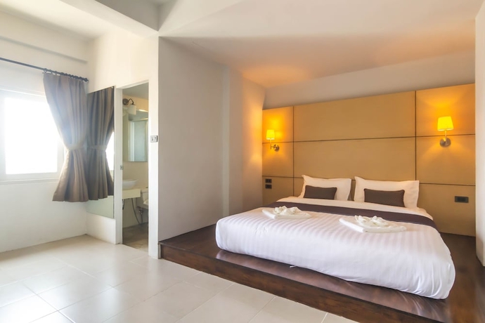 Imagen de la habitación del Hotel Montree Phuket. Foto 9