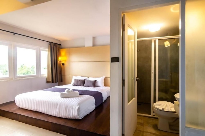 Imagen de la habitación del Hotel Montree Phuket. Foto 10