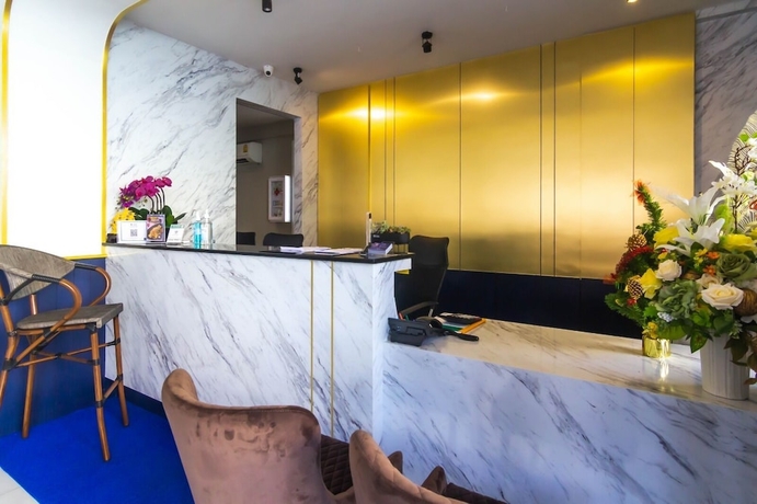 Imagen de los interiores del Hotel Montree Phuket. Foto 16