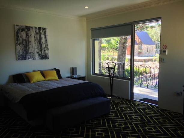 Imagen de la habitación del Hotel Montville Suites. Foto 9