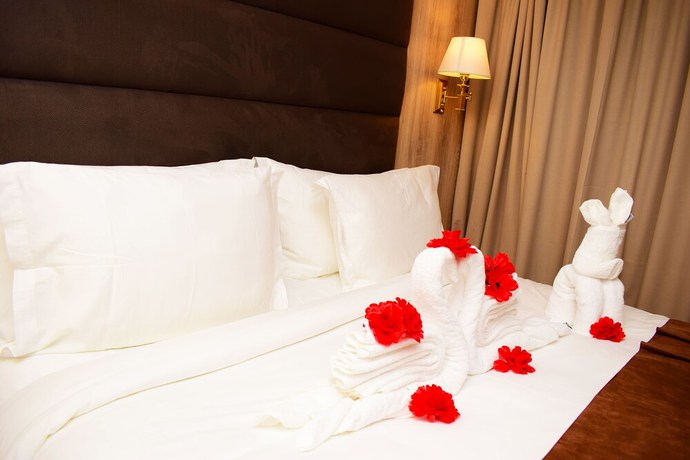 Imagen de la habitación del Hotel Monty Suites and Golf. Foto 2