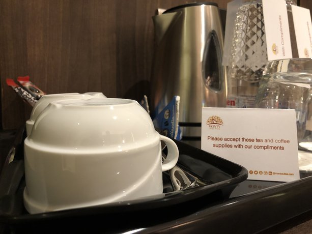 Imagen de la habitación del Hotel Monty Suites and Golf. Foto 4