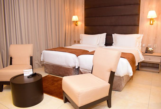 Imagen de la habitación del Hotel Monty Suites and Golf. Foto 7