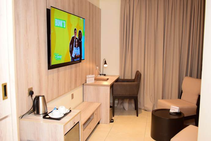 Imagen de la habitación del Hotel Monty Suites and Golf. Foto 10