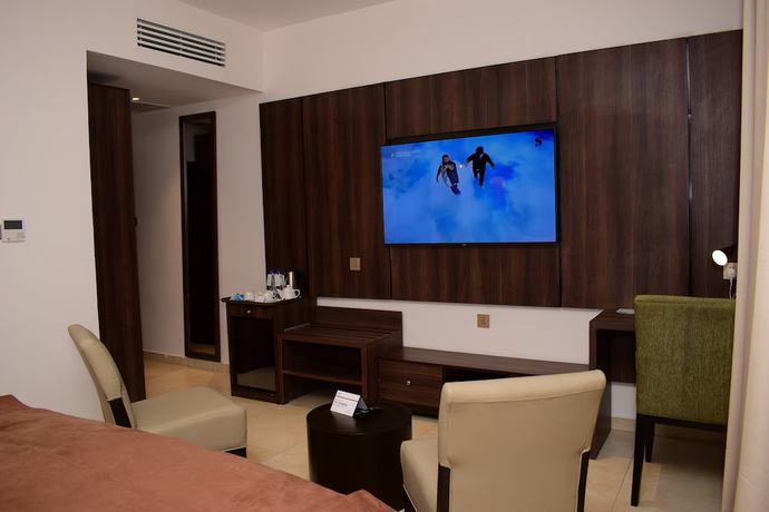 Imagen de la habitación del Hotel Monty Suites and Golf. Foto 13