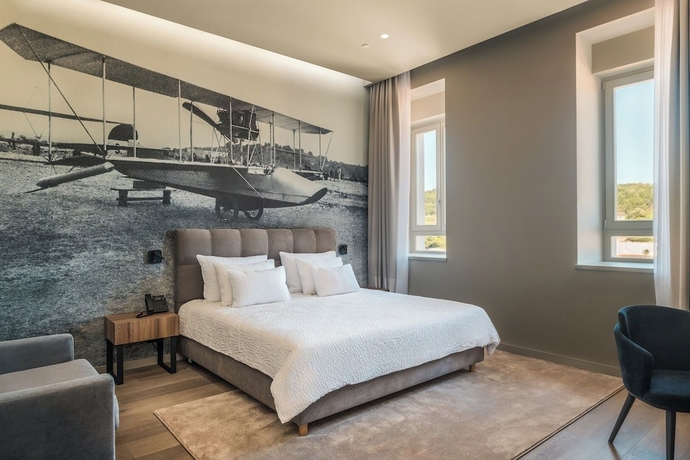 Imagen de la habitación del Hotel Monumenti Heritage and Resort. Foto 4