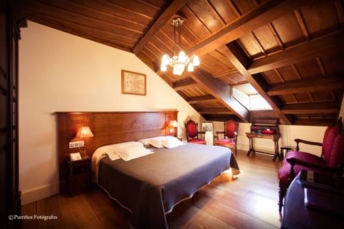 Imagen de la habitación del Hotel Monumento Pazo De Orbán. Foto 12