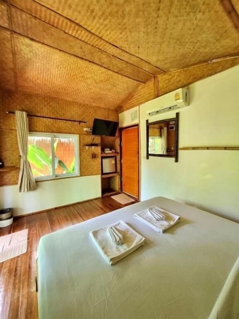 Imagen de la habitación del Hotel Mook Montra Resort Seafront. Foto 11