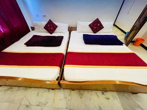 Imagen de la habitación del Hotel Mookambigai Residency. Foto 17