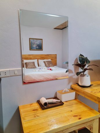 Imagen de la habitación del Hotel Mookboonchu Guesthouse. Foto 4