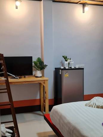 Imagen de la habitación del Hotel Mookboonchu Guesthouse. Foto 6
