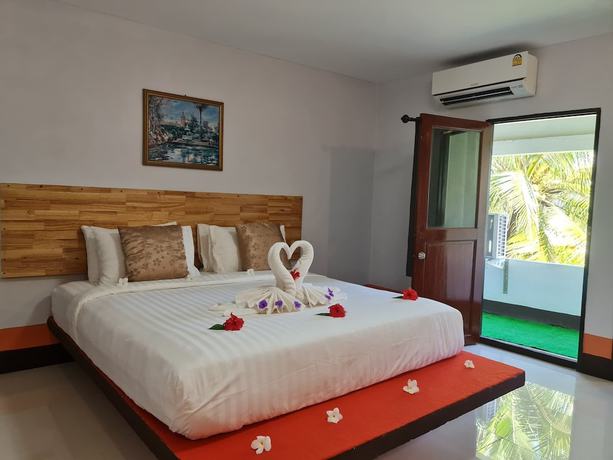 Imagen de la habitación del Hotel Mookboonchu Guesthouse. Foto 10