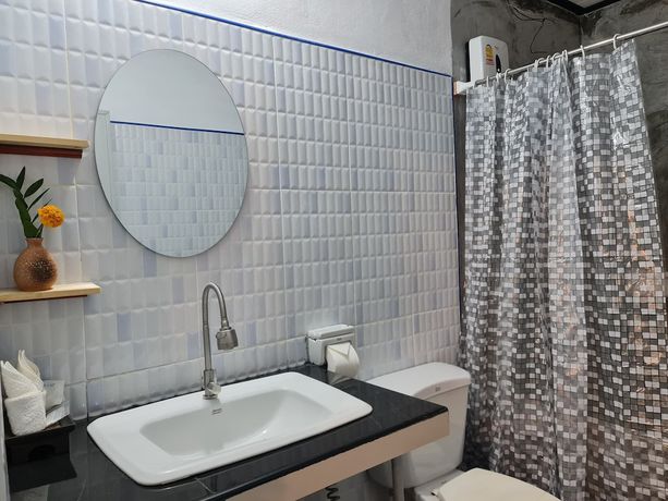 Imagen de la habitación del Hotel Mookboonchu Guesthouse. Foto 15