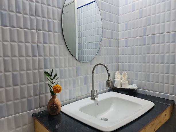 Imagen de la habitación del Hotel Mookboonchu Guesthouse. Foto 16