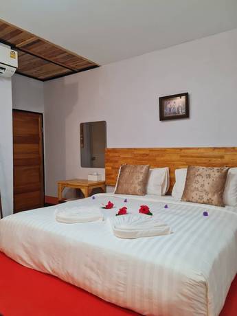 Imagen de la habitación del Hotel Mookboonchu Guesthouse. Foto 17