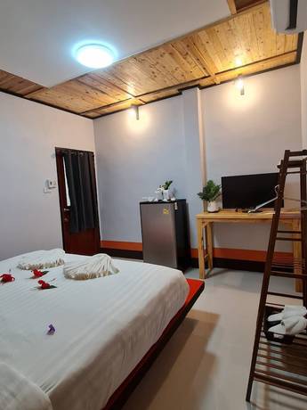 Imagen de la habitación del Hotel Mookboonchu Guesthouse. Foto 18