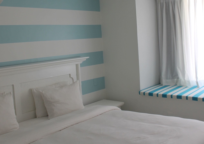 Imagen de la habitación del Hotel Moomba Beach Club. Foto 7